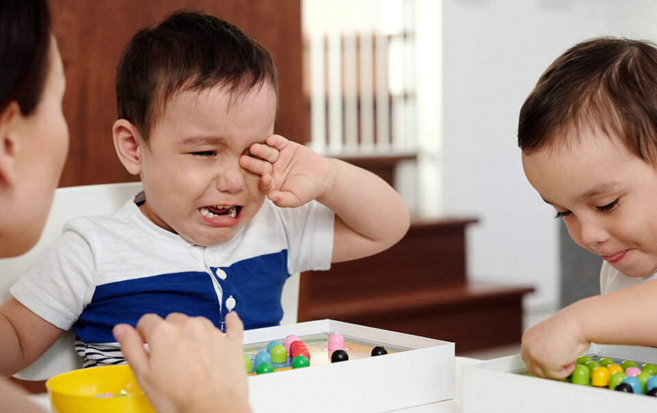 Mother dealing with a toddler meltdown