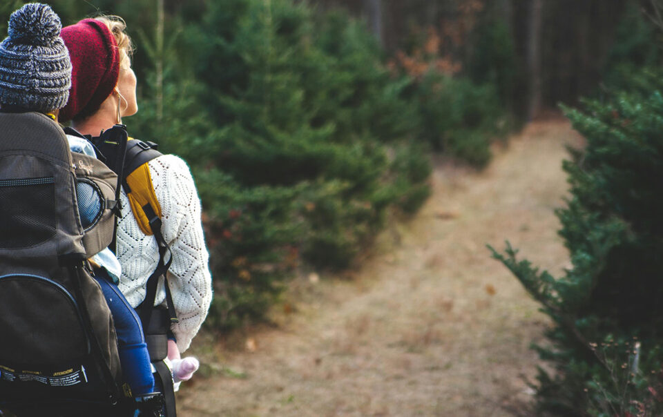 Mother and child hiking in the woods, starting on their journey of mindful parenting